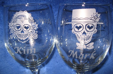 wine glasses Personalized Engraved Sugar Skull Bride and Grooms close up of Personalized Engraved Sugar Skull Bride and Groom wine glasses